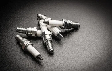 spark plugs on black background 260nw 753770953